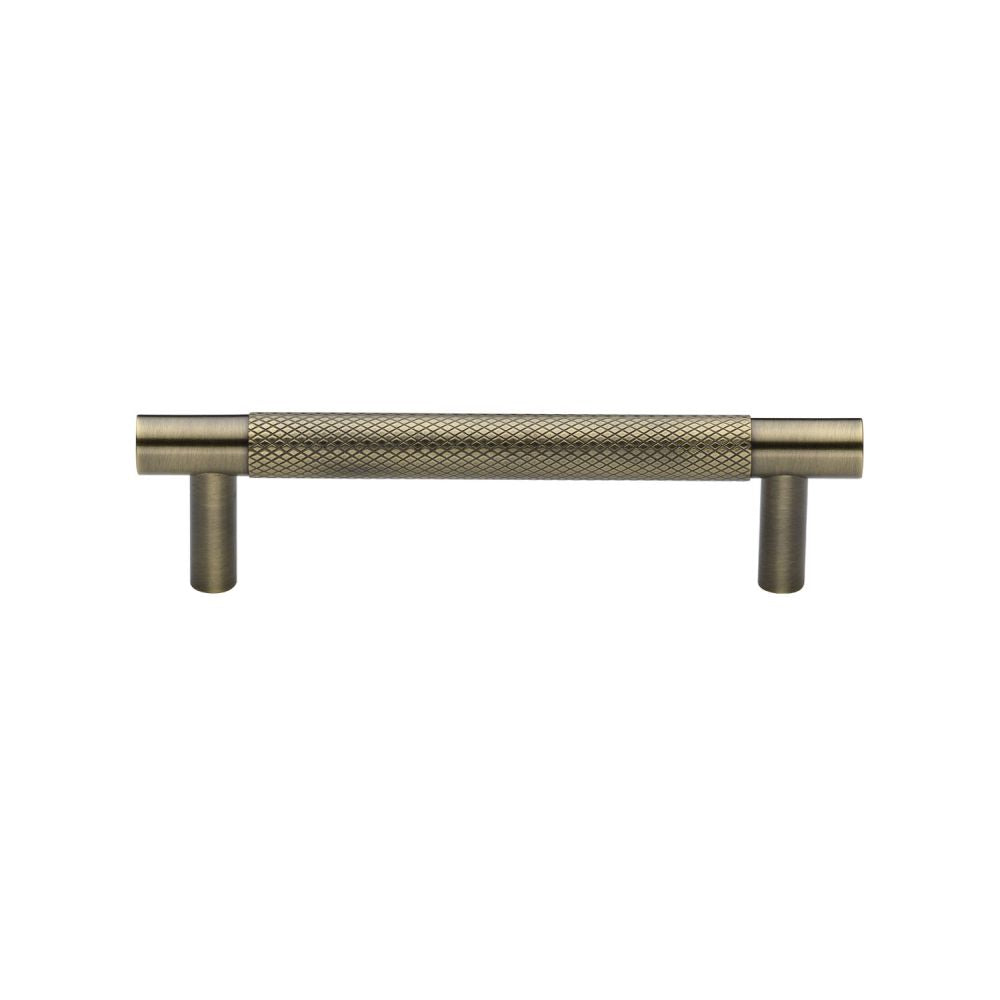 This is an image of a Heritage Brass - Cabinet Pull Partial Knurled Design 96mm CTC Antique Brass Finish, v4461-96-at that is available to order from T.H Wiggans Ironmongery in Kendal.