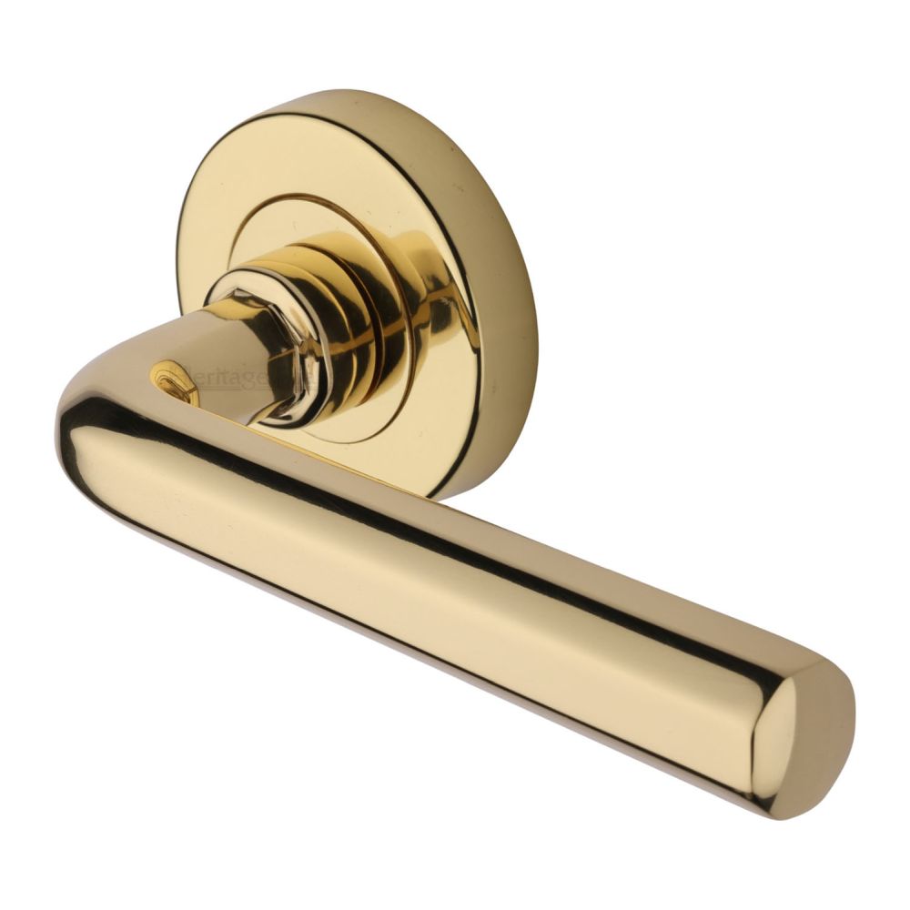 This is an image of a Heritage Brass - Door Handle Lever Latch on Round Rose Octave Design Polished Brass, v4545-pb that is available to order from T.H Wiggans Ironmongery in Kendal.