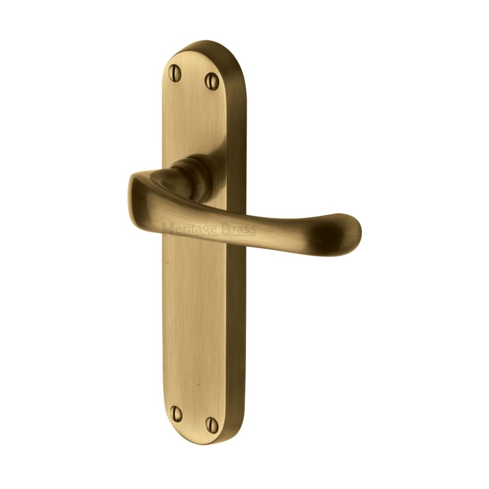 This is an image of a Heritage Brass - Door Handle Lever Latch Gloucester Design Antique Brass Finish, v6060-at that is available to order from T.H Wiggans Ironmongery in Kendal.