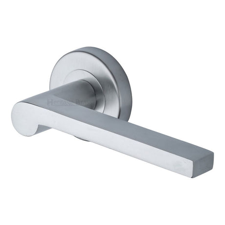 This is an image of a Heritage Brass - Door Handle Lever Latch on Round Rose Metro Mid Century Design, v6225-sc that is available to order from T.H Wiggans Ironmongery in Kendal.