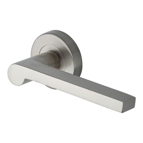 This is an image of a Heritage Brass - Door Handle Lever Latch on Round Rose Metro Mid Century Design, v6225-sn that is available to order from T.H Wiggans Ironmongery in Kendal.