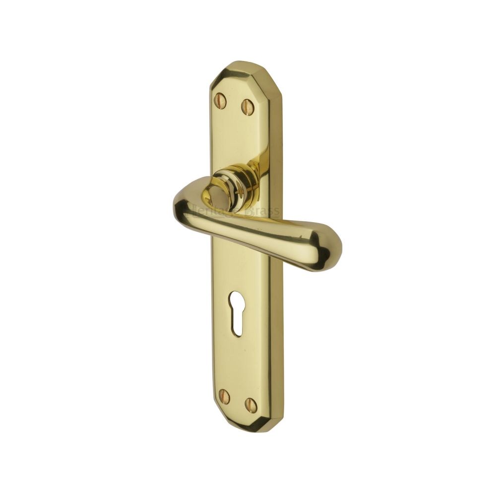 This is an image of a Heritage Brass - Door Handle Lever Lock Charlbury Design Polished Brass Finish, v7050-pb that is available to order from T.H Wiggans Ironmongery in Kendal.