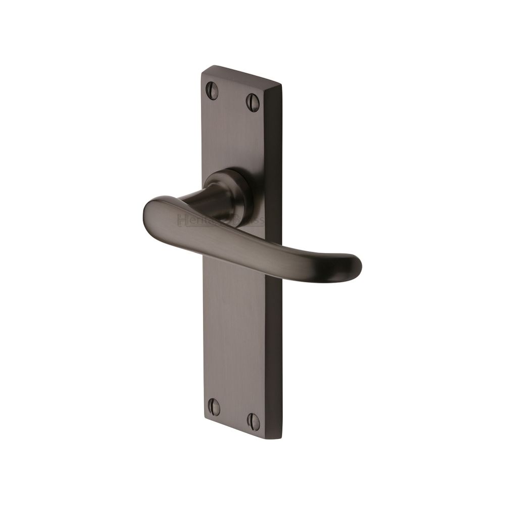 This is an image of a Heritage Brass - Door Handle Lever Latch Windsor Design Matt Bronze Finish, v713-mb that is available to order from T.H Wiggans Ironmongery in Kendal.
