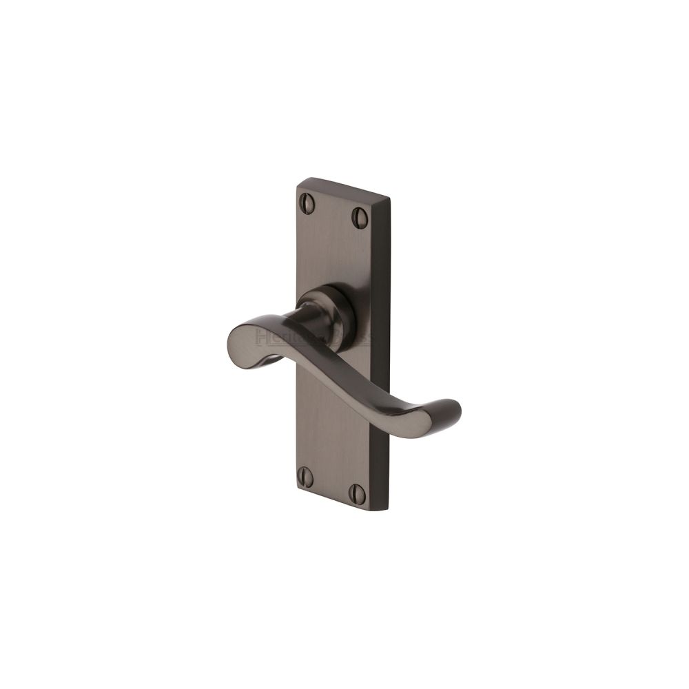 This is an image of a Heritage Brass - Door Handle Lever Latch Bedford Short Design Matt Bronze Finish, v800-mb that is available to order from T.H Wiggans Ironmongery in Kendal.