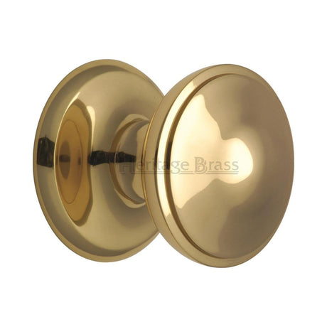 This is an image of a Heritage Brass - Round Centre Door Knob 3 Unlacquered Brass Finish, v900-ulb that is available to order from T.H Wiggans Ironmongery in Kendal.