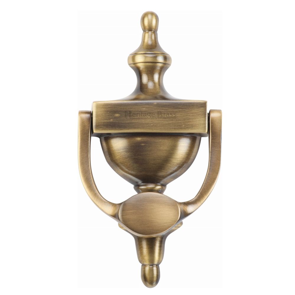 This is an image of a Heritage Brass - Urn Knocker 7 1/4" Antique Brass Finish, v910-195-at that is available to order from T.H Wiggans Ironmongery in Kendal.