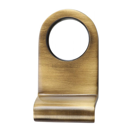 This is an image of a Heritage Brass - Round Cylinder Pull Antique Brass Finish, v930-at that is available to order from T.H Wiggans Ironmongery in Kendal.