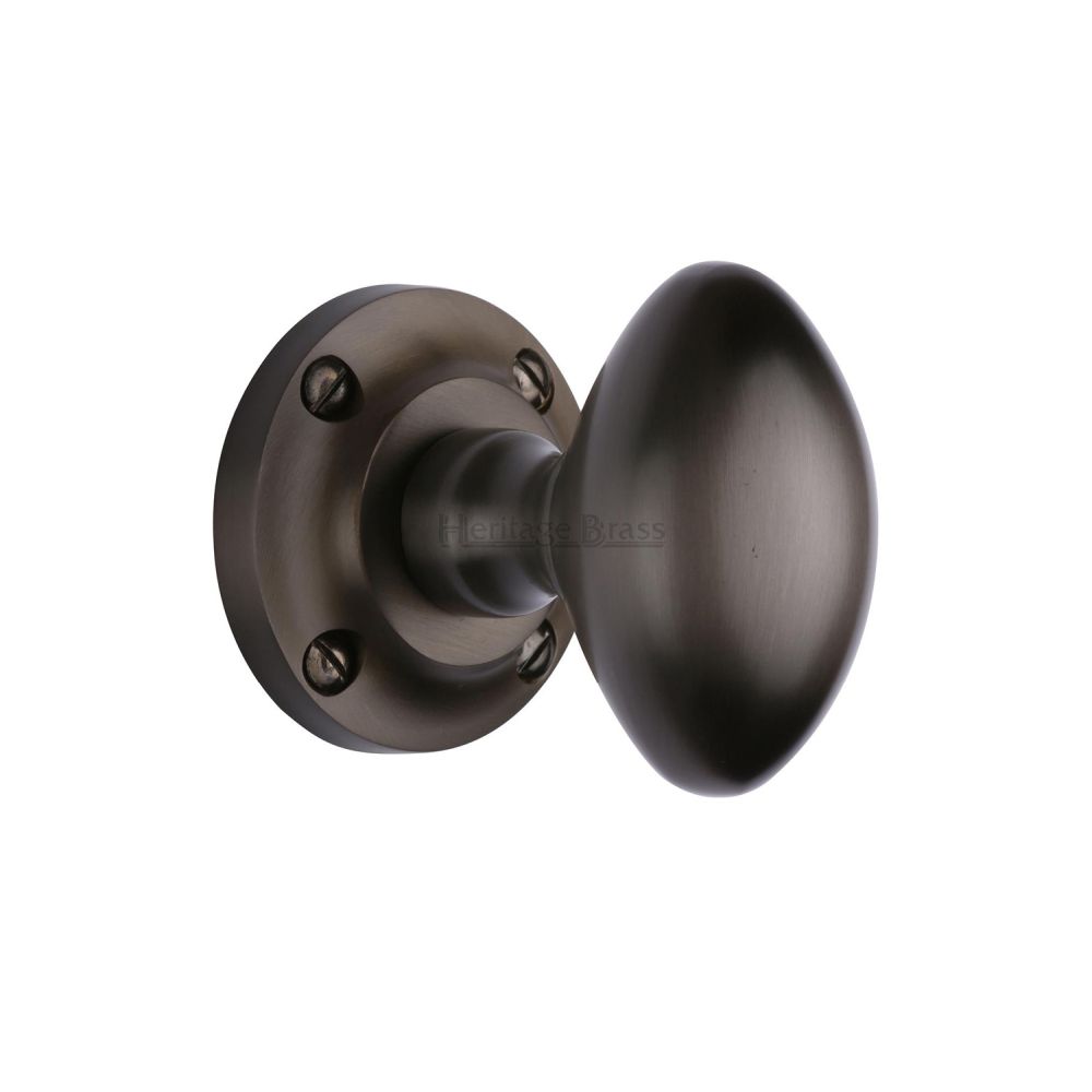 This is an image of a Heritage Brass - Mortice Knob on Rose Suffolk Design Matt Bronze Finish, v960-mb that is available to order from T.H Wiggans Ironmongery in Kendal.