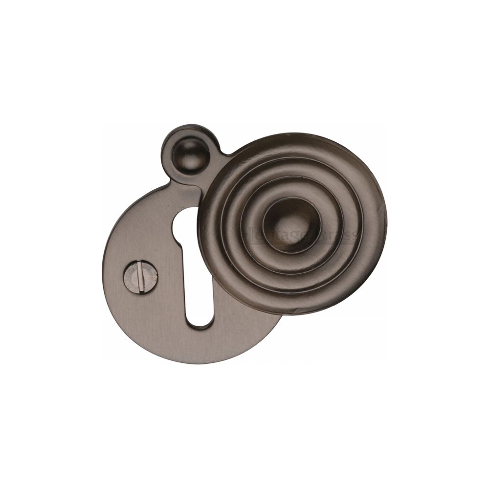 This is an image of a Heritage Brass - Covered Keyhole Reeded Matt Bronze Finish, v972-mb that is available to order from T.H Wiggans Ironmongery in Kendal.