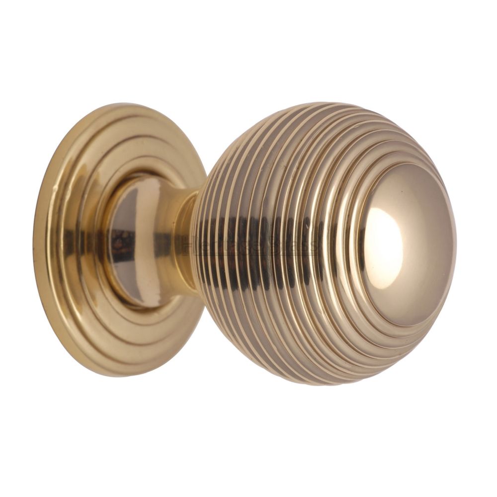 This is an image of a Heritage Brass - Cabinet Knob Reeded Design 32mm Polished Brass Finish, v973-32-pb that is available to order from T.H Wiggans Ironmongery in Kendal.