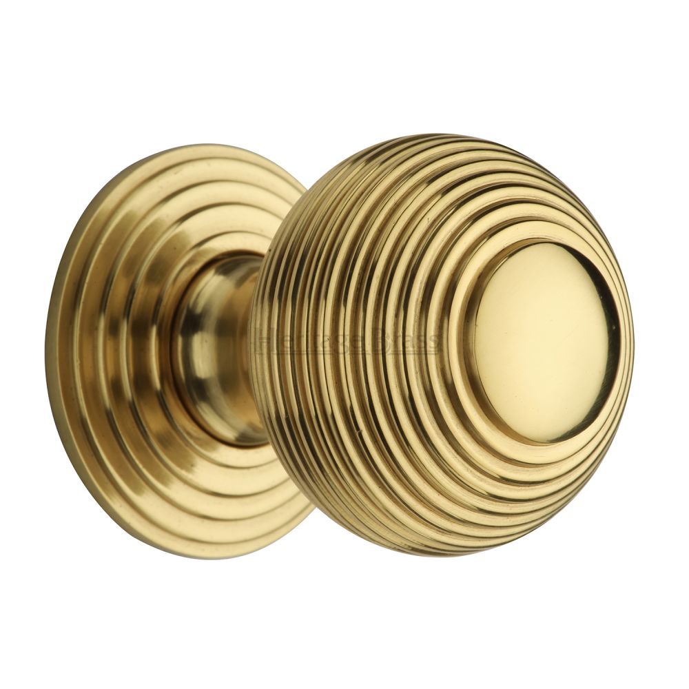 This is an image of a Heritage Brass - Cabinet Knob Reeded Design 38mm Polished Brass Finish, v973-38-pb that is available to order from T.H Wiggans Ironmongery in Kendal.