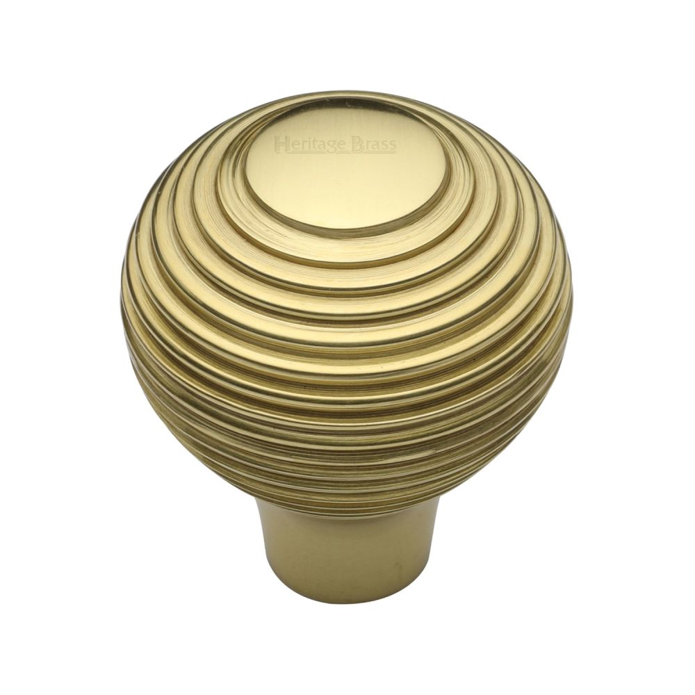 This is an image of a Heritage Brass - Cabinet Knob Reeded Design 32mm Polished Brass Finish, v974-32-pb that is available to order from T.H Wiggans Ironmongery in Kendal.