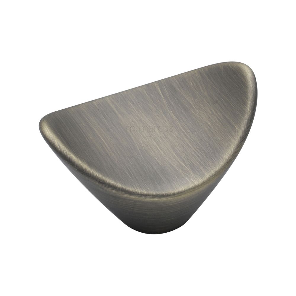 This is an image of a M.Marcus - Calyx Cabinet Knob Distressed Brass Finish, vf392-38-db that is available to order from T.H Wiggans Ironmongery in Kendal.