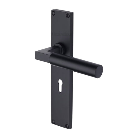This is an image of a Heritage Brass - Bauhaus Lever Lock Door Handle on 200mm Plate Matt Black finish, vt6300-bkmt that is available to order from T.H Wiggans Ironmongery in Kendal.