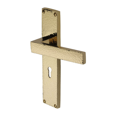This is an image of a Heritage Brass - Delta Hammered Lever Lock Door Handle on 200mm Plate Polished Brass finish, vth3300-pb that is available to order from T.H Wiggans Ironmongery in Kendal.
