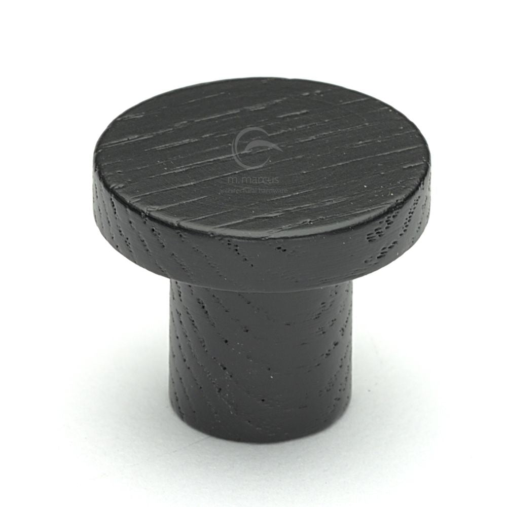 This is an image of a M.Marcus - Wooden Cabinet Knob Round Circum Design 48mm Black Ash Finish, w4470-48-ash that is available to order from T.H Wiggans Ironmongery in Kendal.