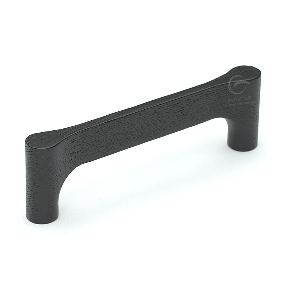 This is an image of a M.Marcus - Wooden Cabinet Pull Handle Gio Design 160mm Black Ash Finish, w7827-160-ash that is available to order from T.H Wiggans Ironmongery in Kendal.