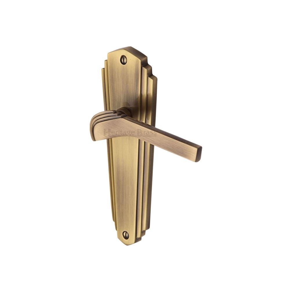 This is an image of a Heritage Brass - Door Handle Lever Latch Waldorf Design Antique Brass Finish, wal6510-at that is available to order from T.H Wiggans Ironmongery in Kendal.