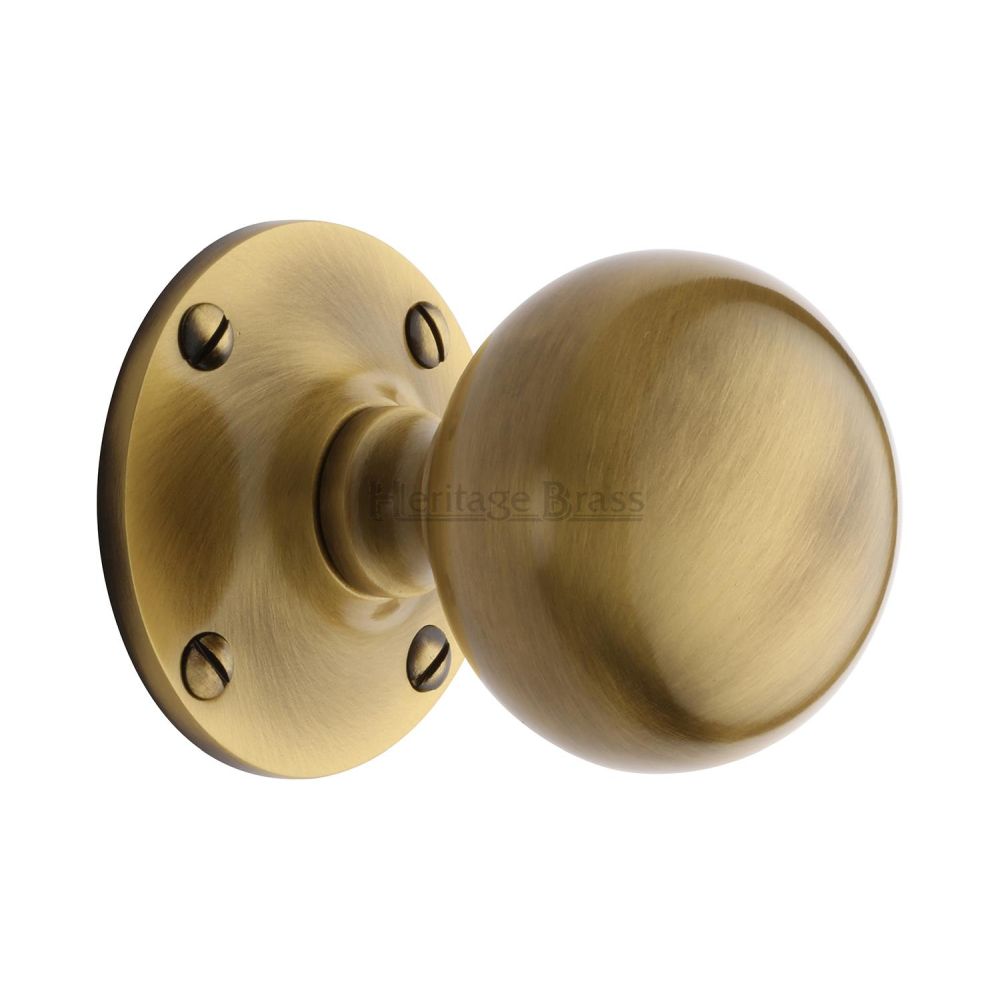 This is an image of a Heritage Brass - Mortice Knob Westminster Design Antique Brass Finish, wes970-at that is available to order from T.H Wiggans Ironmongery in Kendal.
