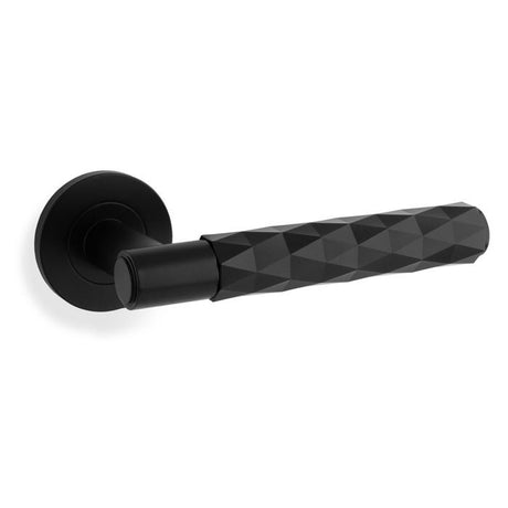 This is an image showing Alexander & Wilks Spitfire Diamond Cut Lever on Round Rose - Black - aw226-BL available to order from T.H. Wiggans Ironmongery in Kendal, with quick delivery and discounted prices.