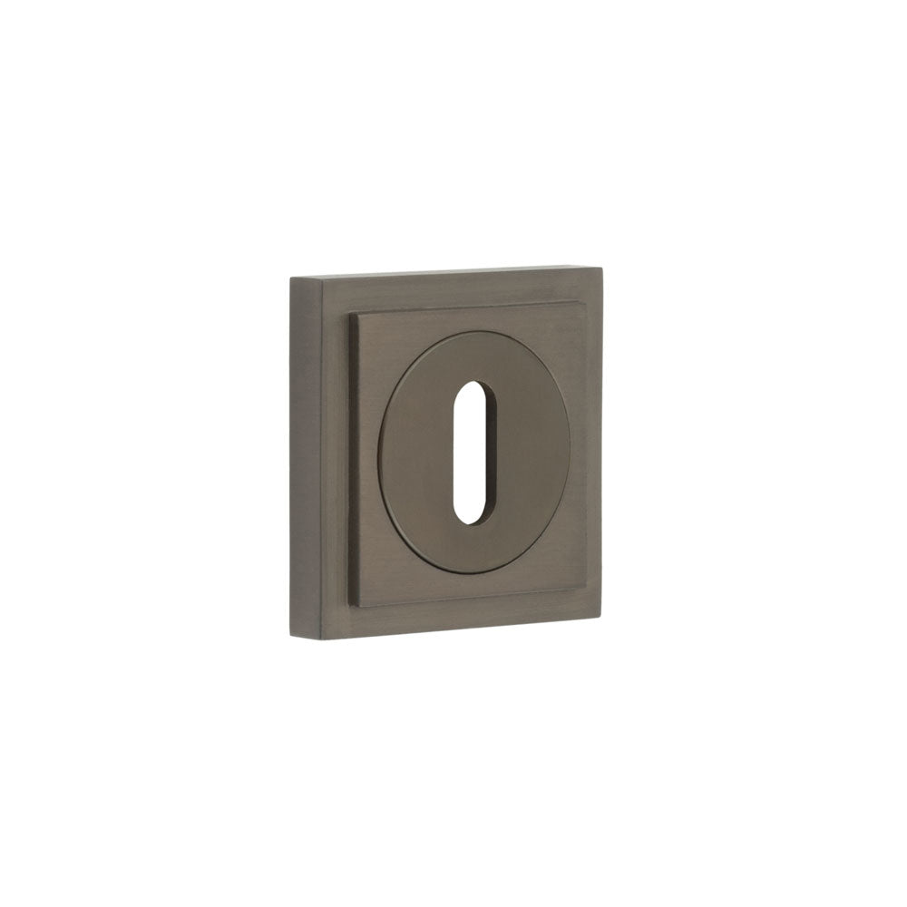 This is an image showing the Frelan - Burlington Standard Keyway Escutcheons Square Stepped Rose Dark Bronze available to order from T.H. Wiggans Ironmongery in Kendal