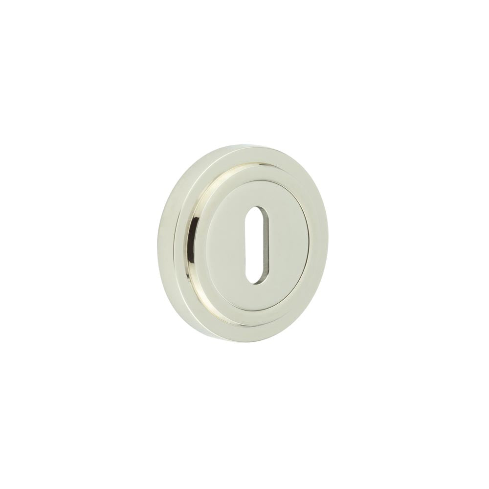 This is an image showing the Frelan - Burlington Standard Keyway Escutcheons Stepped Rose Polished Nickel available to order from T.H. Wiggans Ironmongery in Kendal