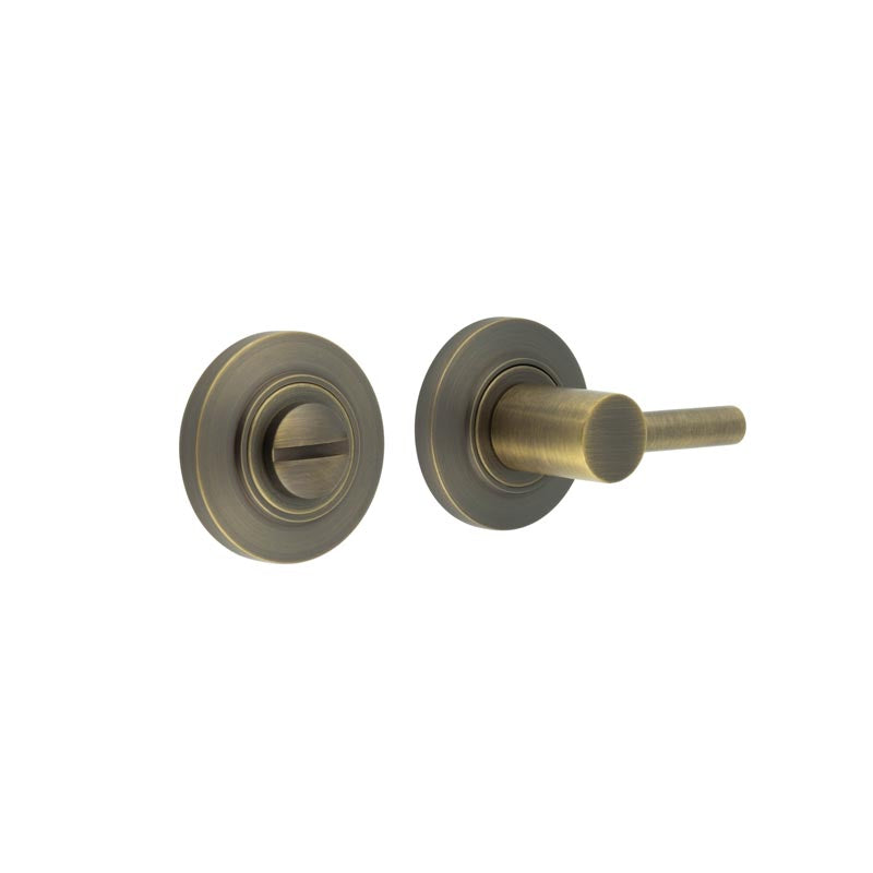 This is an image showing the Frelan - Burlington Easy Turn & Release Chamfered Rose Antique Brass available to order from T.H. Wiggans Ironmongery in Kendal