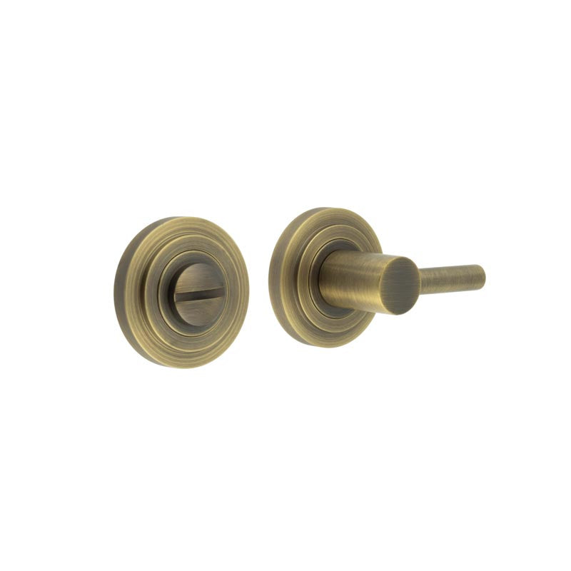 This is an image showing the Frelan - Burlington Easy Turn & Release Stepped Rose Antique Brass available to order from T.H. Wiggans Ironmongery in Kendal