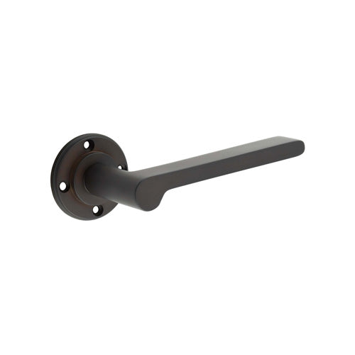 This is an image showing the Burlington - Fitzrovia Lever on Rose Door Handle - Roses Sold Separately available to order from T.H. Wiggans Ironmongery in Kendal