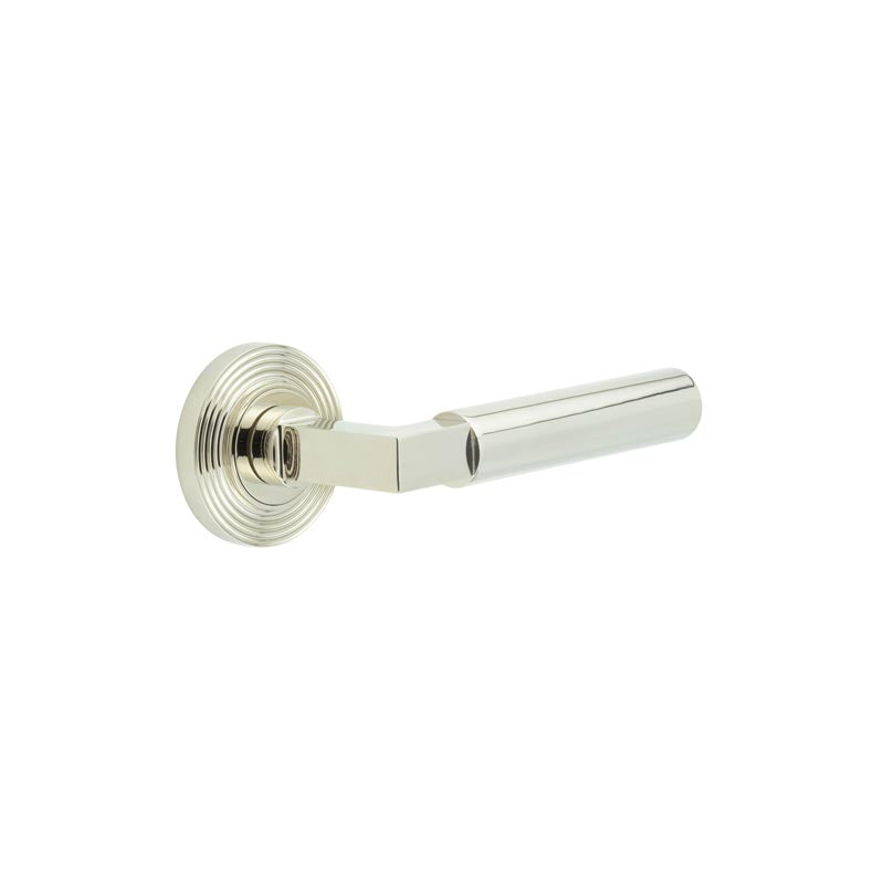 This is an image showing the Frelan - Westminster Door Handles Reeded Rose Polished Nickel available to order from T.H. Wiggans Ironmongery in Kendal