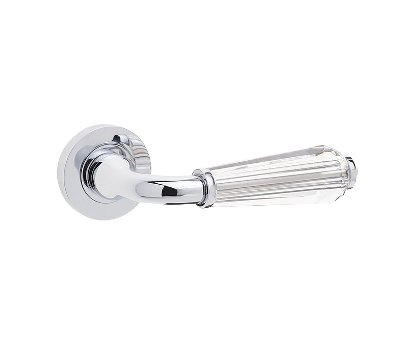 This is an image showing the Frelan - Fluted Door Handle on Rose Glass/Polished Chrome available to order from T.H. Wiggans Ironmongery in Kendal