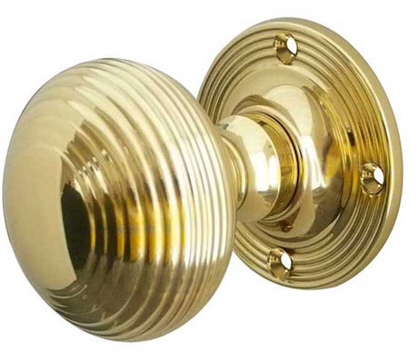 This is an image showing the Frelan - Reeded Unsprung Mortice Knobs - Polished Brass available to order from T.H. Wiggans Ironmongery in Kendal