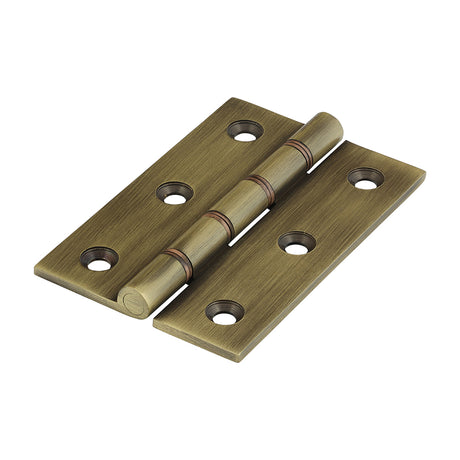 This is an image showing TIMCO Double Phosphor Bronze Washered Butt Hinge - Solid Brass - Antique Brass - 76 x 50 - 2 Pieces Box available from T.H Wiggans Ironmongery in Kendal, quick delivery at discounted prices.