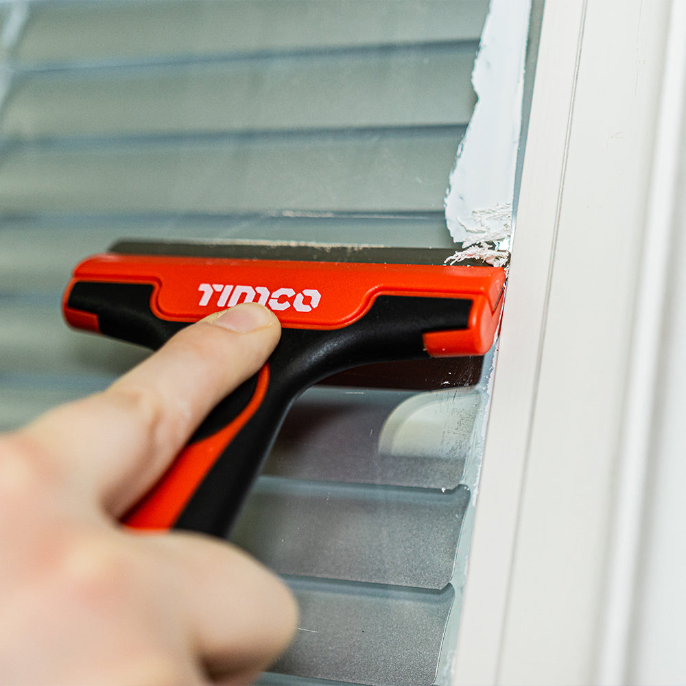 This is an image showing TIMCO Tile & Glass Scraper - 100mm - 1 Each Backing Card available from T.H Wiggans Ironmongery in Kendal, quick delivery at discounted prices.
