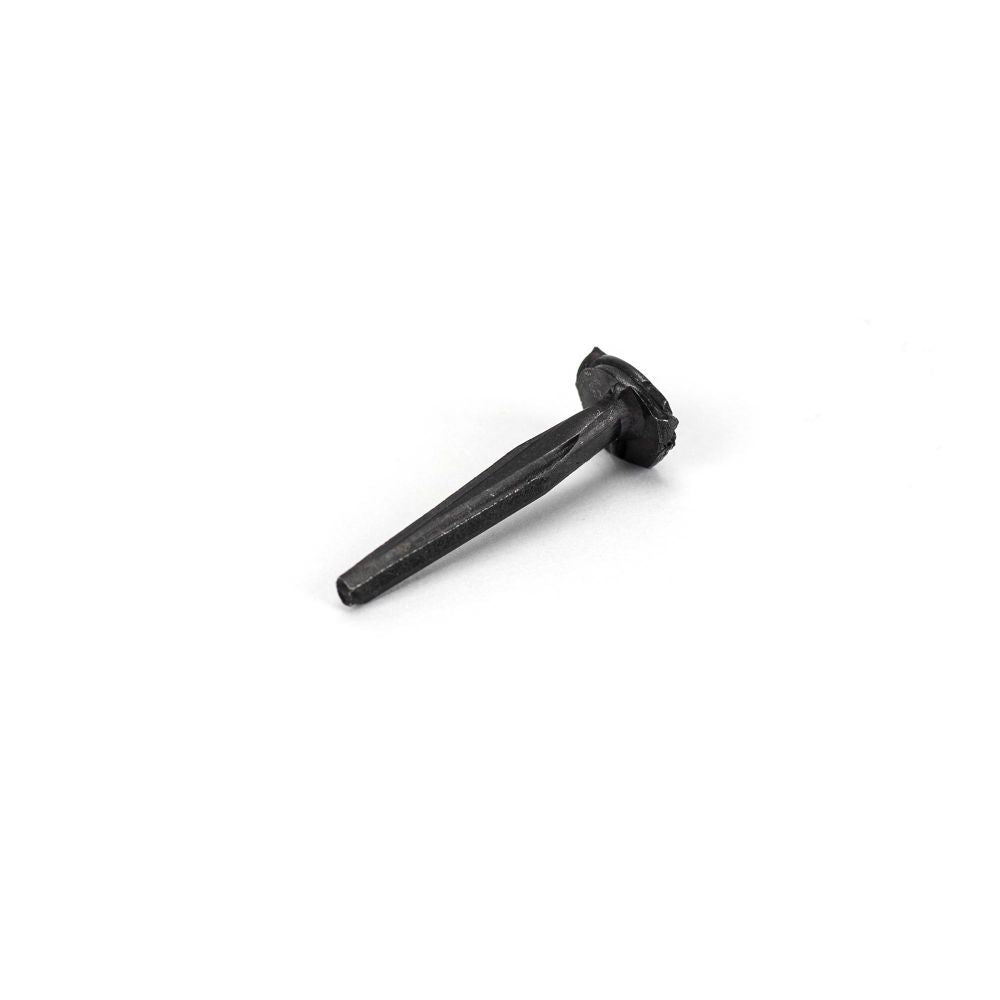 This is an image showing From The Anvil - Black Oxide 1" Rosehead Nail (1kg) available from trade door handles, quick delivery and discounted prices