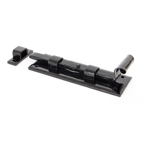 This is an image showing From The Anvil - Black 6" Straight Door Bolt available from T.H Wiggans Architectural Ironmongery in Kendal, quick delivery and discounted prices