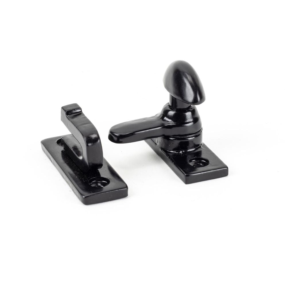 This is an image showing From The Anvil - Black Cupboard Turn available from trade door handles, quick delivery and discounted prices