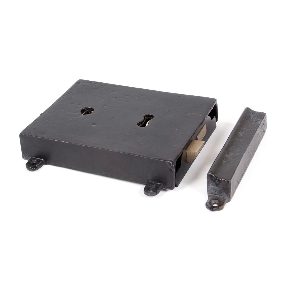 This is an image showing From The Anvil - Beeswax Rim Lock & Cast Iron Cover available from T.H Wiggans Architectural Ironmongery in Kendal, quick delivery and discounted prices
