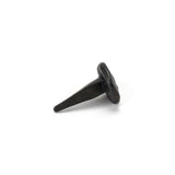 This is an image showing From The Anvil - Beeswax 1" Handmade Nail (20mm HD DIA) available from trade door handles, quick delivery and discounted prices