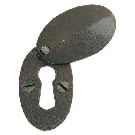 This is an image of From The Anvil - Beeswax Oval Escutcheon & Cover available to order from T.H Wiggans Architectural Ironmongery in Kendal, quick delivery and discounted prices.