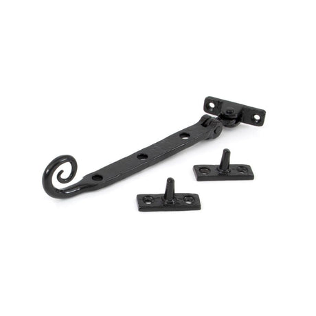 This is an image showing From The Anvil - Black 8" Handmade Monkeytail Stay available from T.H Wiggans Architectural Ironmongery in Kendal, quick delivery and discounted prices
