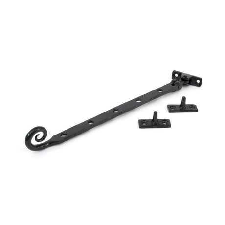 This is an image showing From The Anvil - Black 12" Handmade Monkeytail Stay available from T.H Wiggans Architectural Ironmongery in Kendal, quick delivery and discounted prices