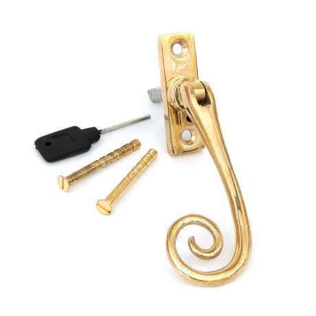 This is an image showing From The Anvil - Polished Brass Slim Monkeytail Espag - LH available from T.H Wiggans Architectural Ironmongery in Kendal, quick delivery and discounted prices