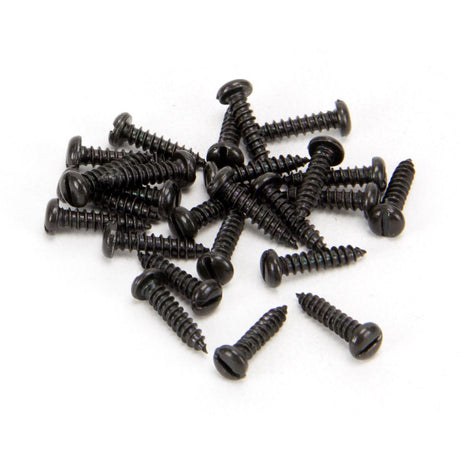This is an image showing From The Anvil - Black 4 x 1/2" Round Head Screws (25) available from T.H Wiggans Architectural Ironmongery in Kendal, quick delivery and discounted prices