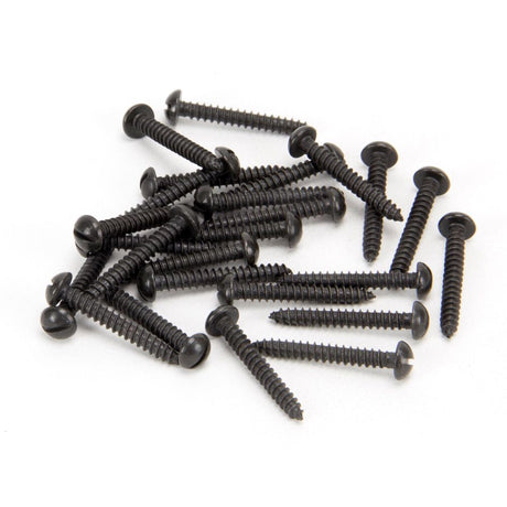 This is an image showing From The Anvil - Black 6 x 1" Round Head Screws (25) available from T.H Wiggans Architectural Ironmongery in Kendal, quick delivery and discounted prices