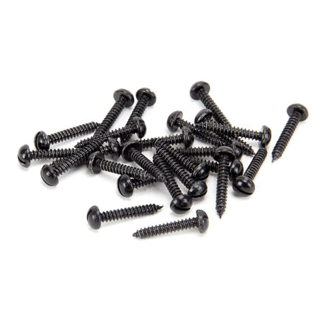 This is an image showing From The Anvil - Black 8 x 1" Round Head Screws (25) available from T.H Wiggans Architectural Ironmongery in Kendal, quick delivery and discounted prices