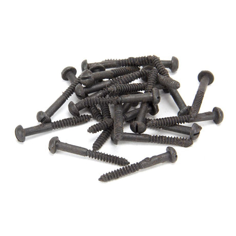 This is an image showing From The Anvil - Beeswax 10 x 1 1/2" Round Head Screws (25) available from T.H Wiggans Architectural Ironmongery in Kendal, quick delivery and discounted prices
