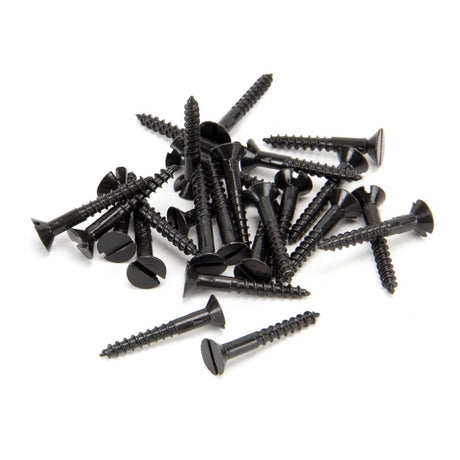This is an image showing From The Anvil - Black 6 x 1" Countersunk Screws (25) available from T.H Wiggans Architectural Ironmongery in Kendal, quick delivery and discounted prices