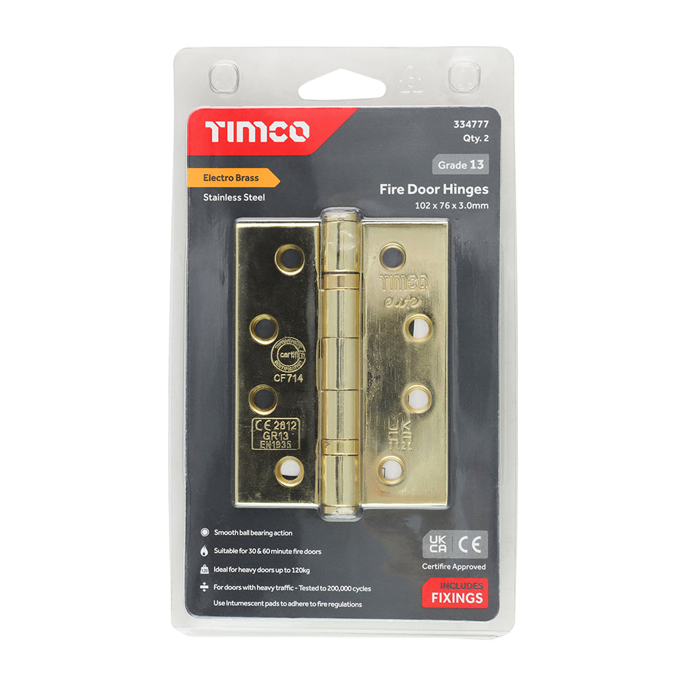 This is an image showing TIMCO Grade 13 Fire Door Hinges - Electro Brass Stainless Steel - 101 x 76 x 3 - 2 Pieces Blister Pack available from T.H Wiggans Ironmongery in Kendal, quick delivery at discounted prices.