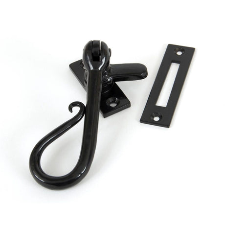 This is an image showing From The Anvil - Black Shepherd's Crook Fastener available from T.H Wiggans Architectural Ironmongery in Kendal, quick delivery and discounted prices